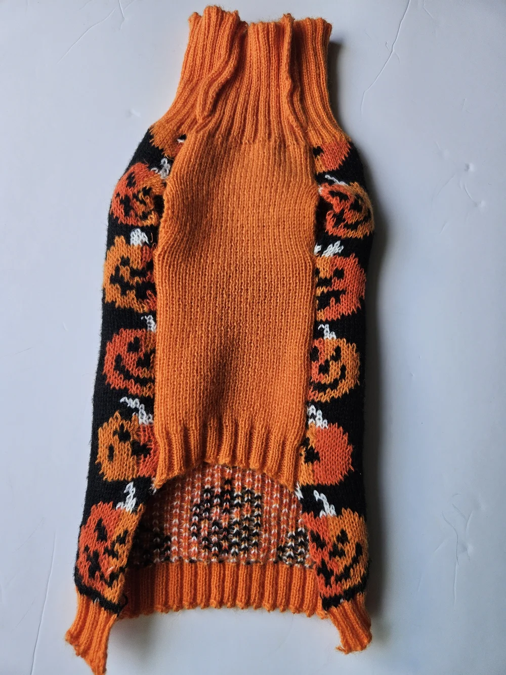 the Hyde & EEK! Boutique Stacked Pumpkins Halloween Dog Sweater. It is a festive